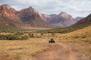 ATV rider on a scenic dirt trail near Zion in Utah during a guided UTV tour experience