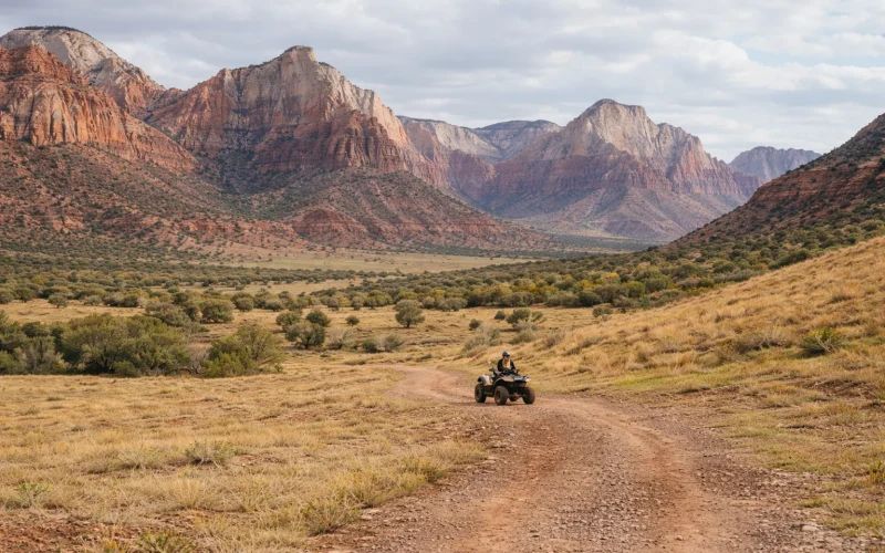 ATV rider on a scenic dirt trail near Zion in Utah during a guided UTV tour experience